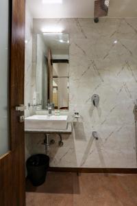Koupelna v ubytování Hotel Ozone Inn Colaba