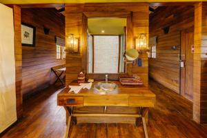 a bathroom with a sink and a mirror at Cinnamon Wild Yala in Yala