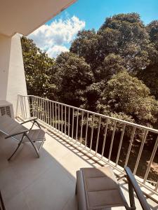 Een balkon of terras bij The Perfect Cozy Home For You