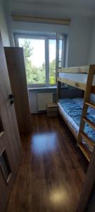 Postel nebo postele na pokoji v ubytování U Witka, Tanie noclegi, Kwatery pracownicze + 2 fotografie
