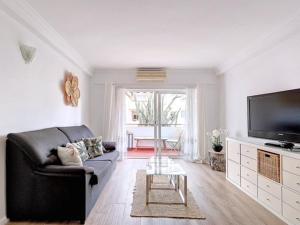 TV a/nebo společenská místnost v ubytování Appartement L’ancora Javea