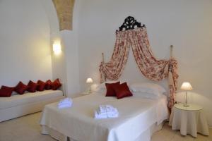Postel nebo postele na pokoji v ubytování Masseria Palane + 37 fotografií