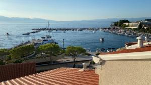 a view of a harbor with boats in the water at Apartment Franjo in Malinska