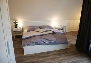 Postel nebo postele na pokoji v ubytování Messe- und Gästezimmer Hildesheim