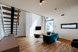 TV a/nebo společenská místnost v ubytování VV hotel & apartments