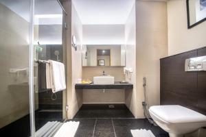 Kupaonica u objektu Marigold Hotel