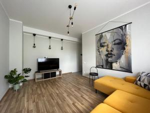 TV a/nebo společenská místnost v ubytování Apartment Jõesuu