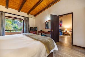 Postel nebo postele na pokoji v ubytování Malaga Hotel
