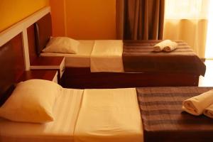 Postel nebo postele na pokoji v ubytování Golden Fleece Hotel