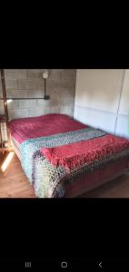 Säng eller sängar i ett rum på Cabañas De Cero
