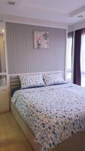 Postel nebo postele na pokoji v ubytování The patio condo คอนโดวิวทะเล Floor 6