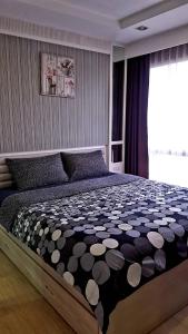 Postel nebo postele na pokoji v ubytování The patio condo คอนโดวิวทะเล Floor 6