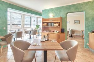 Kuchyň nebo kuchyňský kout v ubytování Apparthotel Minerva Diana Octavia