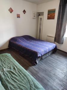 Postel nebo postele na pokoji v ubytování Appart Cosy Henin Centre