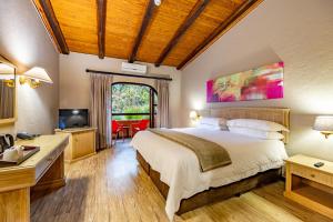 Postel nebo postele na pokoji v ubytování Malaga Hotel + 26 fotografií