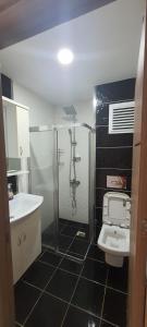 a bathroom with a shower and a toilet at Apartment in Antalya Konyaaltı in Antalya