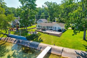 A bird's-eye view of Higgins Lake House and Bunkhouse with Private Dock!