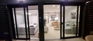 a room with a bedroom and a living room with a bed at Flamenca Village Resort apt 172 in Playa Flamenca