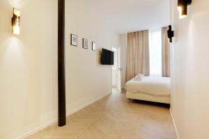 Televízia a/alebo spoločenská miestnosť v ubytovaní Chic apartment - 3BR-8P - Le Marais