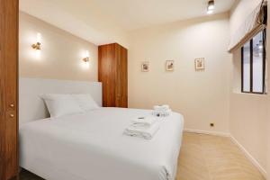 Posteľ alebo postele v izbe v ubytovaní Chic apartment - 3BR-8P - Le Marais