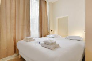Posteľ alebo postele v izbe v ubytovaní Chic apartment - 3BR-8P - Le Marais