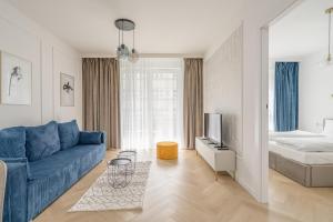 Кровать или кровати в номере RentPlanet - Przedmieście Oławskie