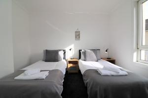 Un pat sau paturi într-o cameră la Signature - Gartlea House