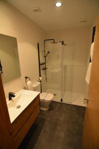 Koupelna v ubytování Apartamentos Fuente La Pipa + 4 fotografie