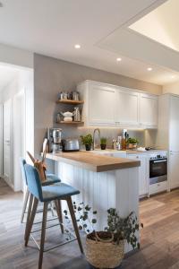 Køkken eller tekøkken på Reetdorf Geltinger Birk Künstlerkate Sommerbrise + 14 billeder