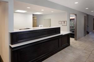 a lobby with a reception counter in a library at Residence Inn Orlando Altamonte Springs / Maitland in Orlando