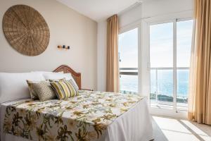 Postel nebo postele na pokoji v ubytování Hotel Cartago Nova by ALEGRIA