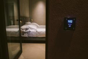 Postel nebo postele na pokoji v ubytování Villa Grumolara & Spa