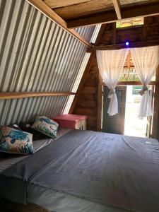 Postel nebo postele na pokoji v ubytování Homie Hava Homestay