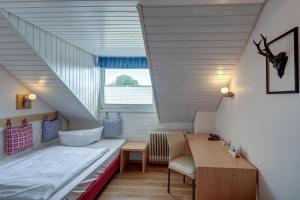 Postel nebo postele na pokoji v ubytování Hotel Leander