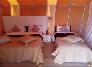 Postel nebo postele na pokoji v ubytování Diament Luxury Camp