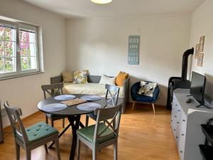 TV a/nebo společenská místnost v ubytování Apartments Hannah