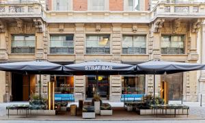 A seating area at STRAF, Milan, a Member of Design Hotels