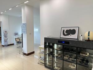 a store with a display of shoes in a room at 金門且停民宿 可包棟 好停車 近市區 in Jinning