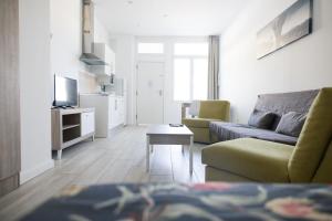 A television and/or entertainment centre at Apartamento VELARDE CENTER one