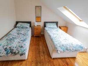 Giường trong phòng chung tại Aisling +10 ảnh