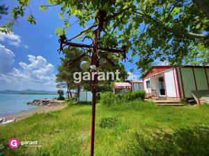 a sign for a garden in front of a house at BLUE DIAMOND SEVAN in Sevan