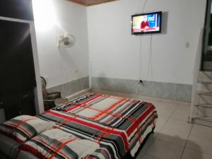 Un ou plusieurs lits dans un hébergement de l'établissement Casa lowcost relajación total!