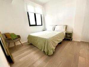 Postel nebo postele na pokoji v ubytování Bello y luminoso apatamento en el Centro Historico + 10 fotografií