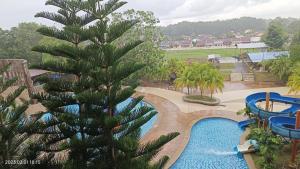 a view of a pool at a resort at Anastays Studio & Apartment Suite with Free 2 & 4 Waterpark Tickets at Bayou Lagoon Resort in Ayer Keroh