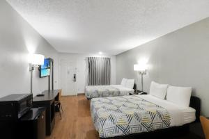 Postel nebo postele na pokoji v ubytování Motel 6-Bryan, TX - University Area