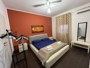 Postel nebo postele na pokoji v ubytování Camera relax riservata intero appartamento