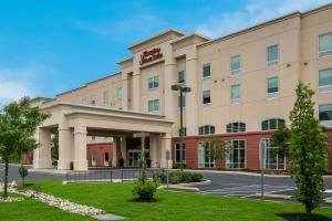 a rendering of the front of a hotel at Hampton Inn & Suites Wilmington Christiana in Newark