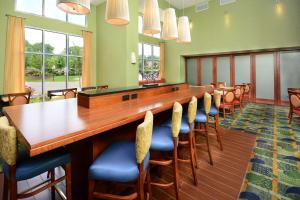 a large conference room with a long table and chairs at Hampton Inn & Suites Durham North I-85 in Durham
