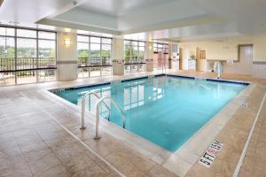 a large swimming pool in a hotel room at Hampton Inn & Suites Durham North I-85 in Durham