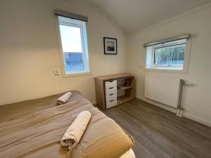 a bedroom with a bed and a window at 2 bedroom apartment in Falun - 2km from centrum in Falun